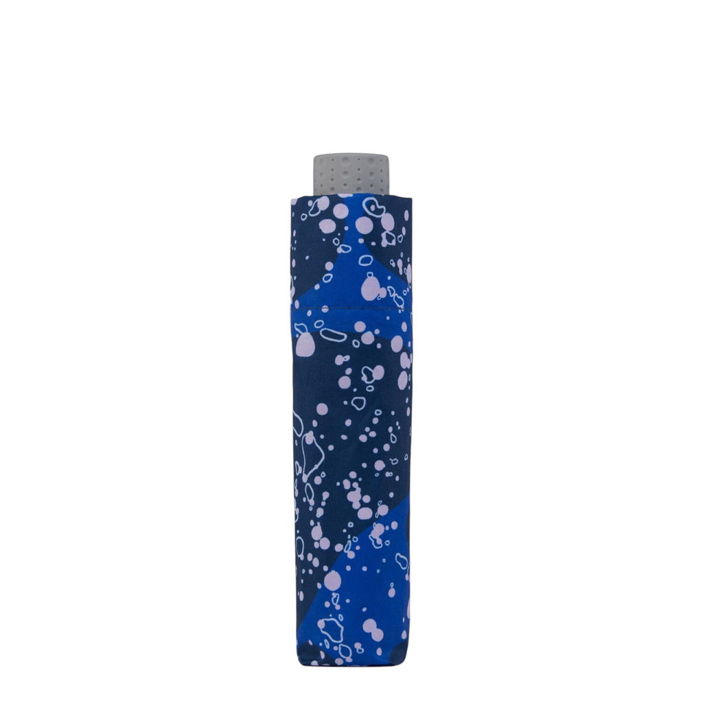Lieblingstasche Affenzahn children's umbrella in a folded, compact blue design with light pink abstract patterns.