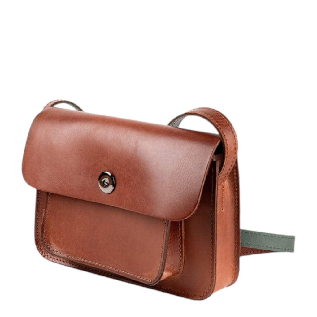 Lieblingstasche Abby brown leather crossbody bag with front pocket and silver clasp.