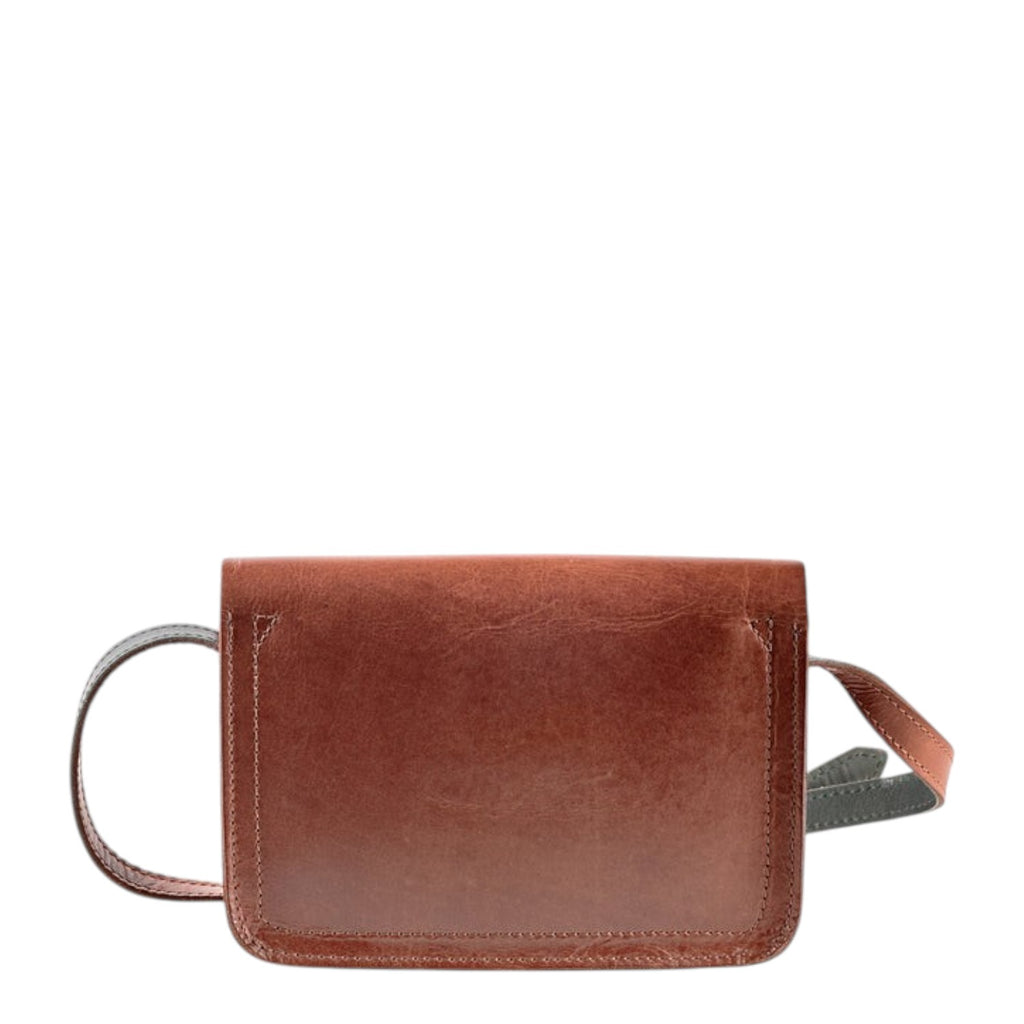 Lieblingstasche Abby crossbody bag in brown leather with a front pocket and adjustable strap.