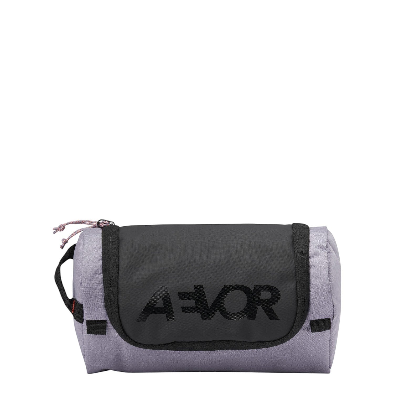 Lieblingstasche AEVOR Wash Pack in light purple and black with a durable zip closure and branded front panel.