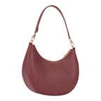 Lieblingstasche Alexia hobo bag in deep red textured leather with gold hardware and a curved silhouette.