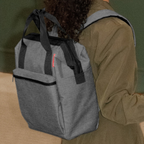 Lieblingstasche Allrounder R insulated backpack in grey worn on the back with black handles and zipper details