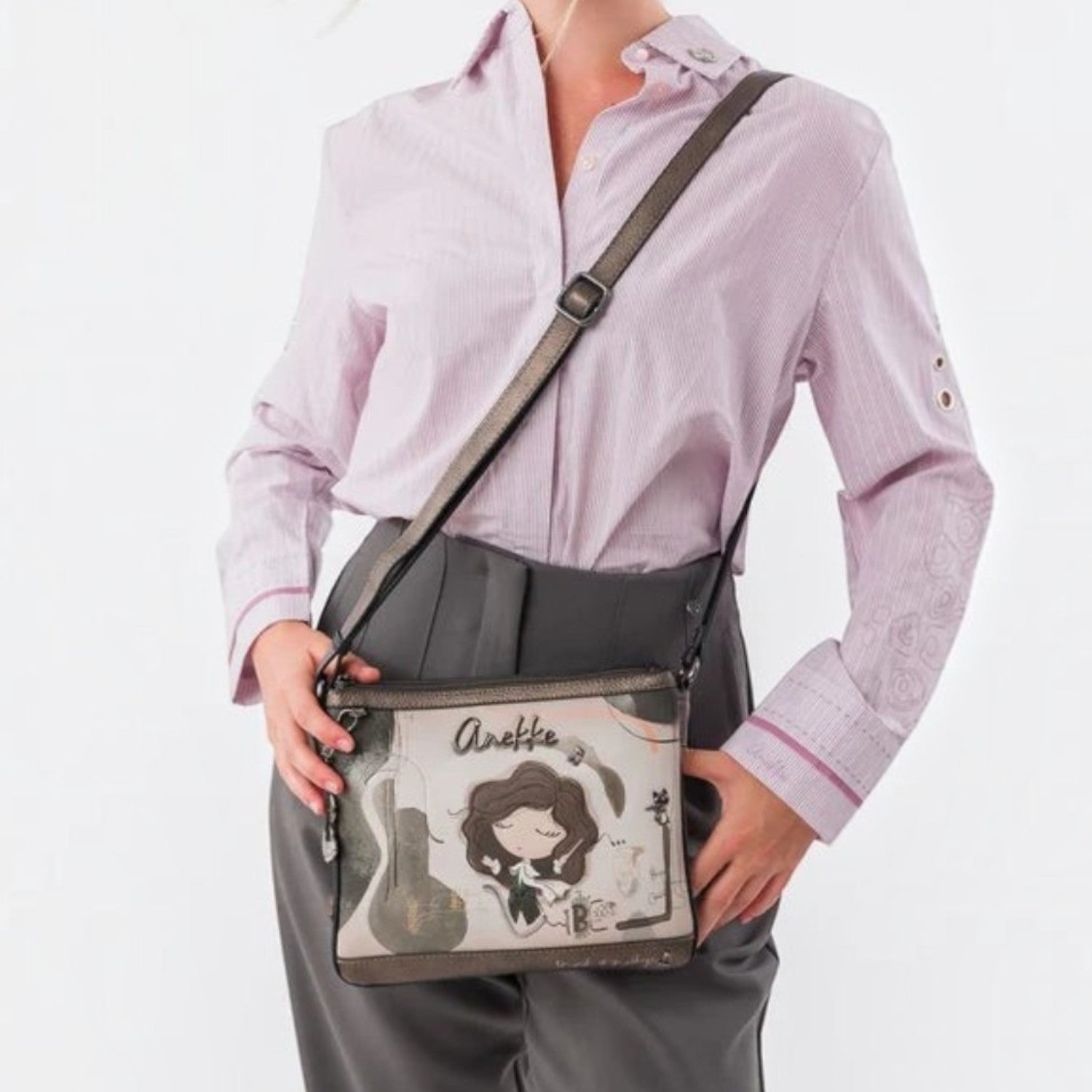 Lieblingstasche cross-body bag with Anekke illustration, featuring grey tones and an adjustable shoulder strap.