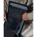 Lieblingstasche Bali Pro black organizer bag with mesh pockets holding keys and tech accessories.