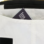 Lieblingstasche Barkasse bag interior with white sailcloth material, black zipper, and a small pocket.