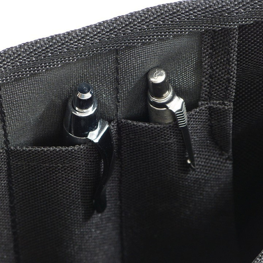Lieblingstasche Barkasse Mini black canvas organizer with pen pockets, holding two pens.