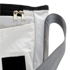 Lieblingstasche Barkasse Mini messenger bag made from white recycled sailcloth with grey strap and black zipper detail