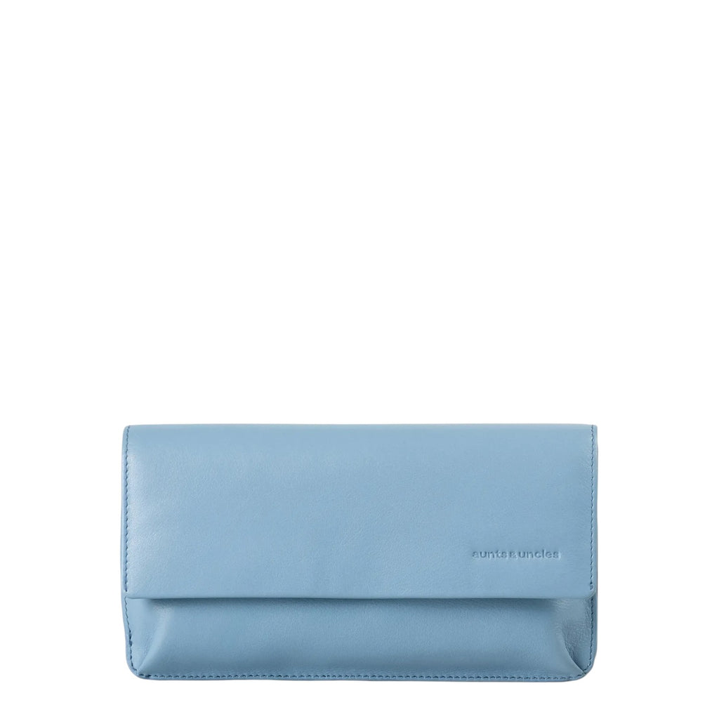 Lieblingstasche Bay light blue leather clutch wallet with a minimalist flap design and embossed branding