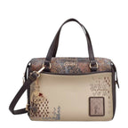 Lieblingstasche short handle bag in beige and brown with decorative embroidery, gold hardware, and a charm pendant.