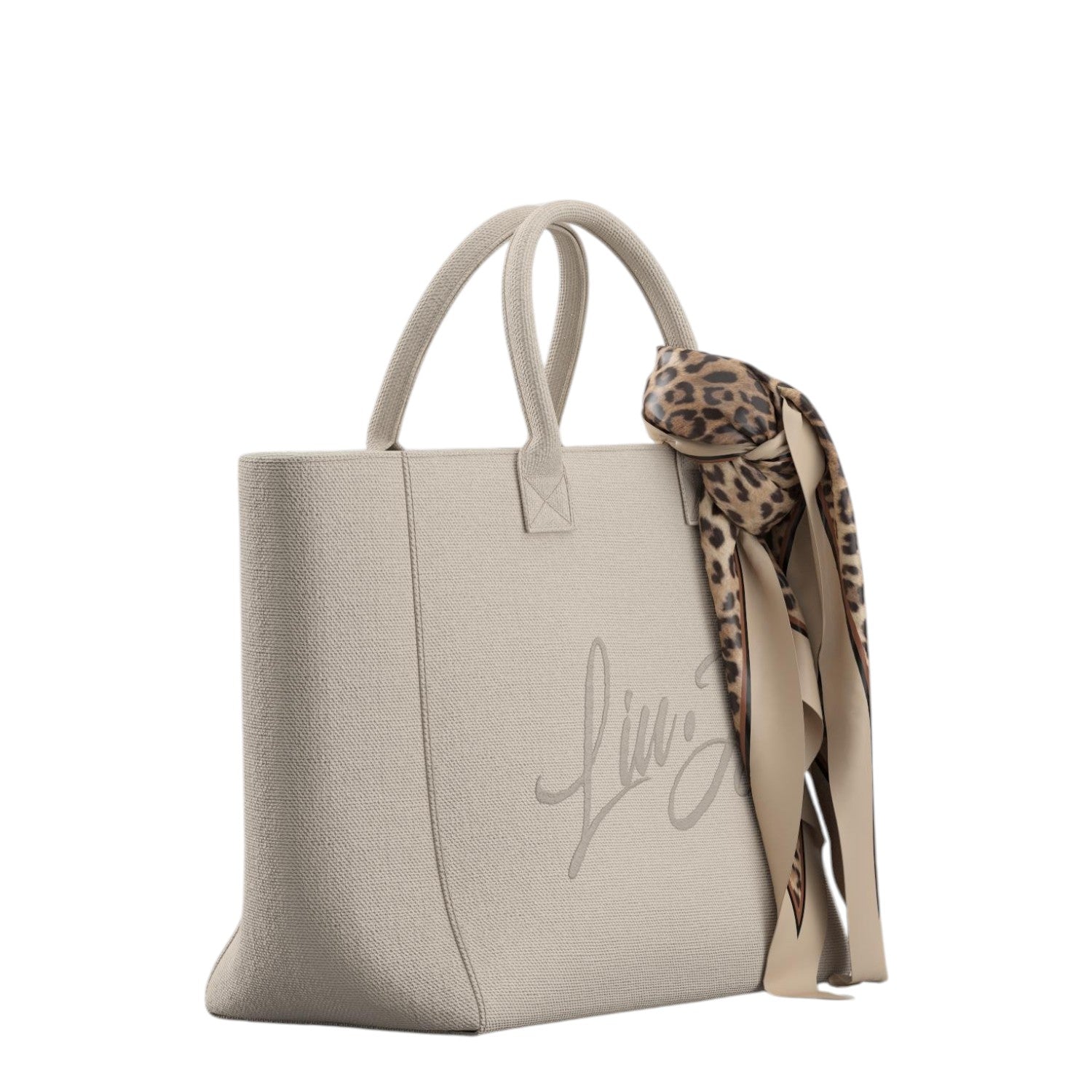 Lieblingstasche Tote L in beige canvas with a decorative leopard print scarf tied to the handle
