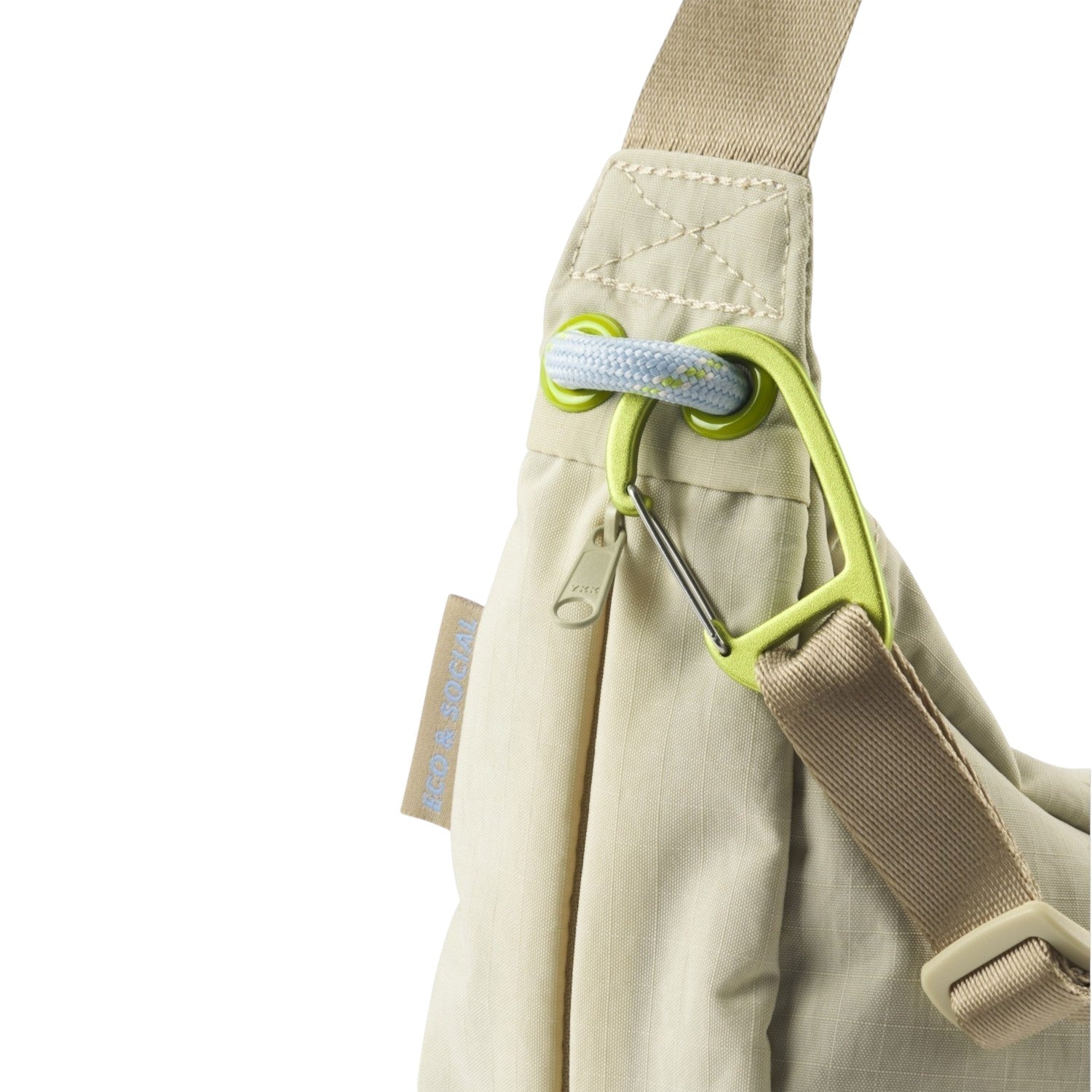 Lieblingstasche beige sling bag featuring a lime green carabiner, durable fabric, and an Eco & Social side label.