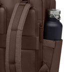Lieblingstasche Bergen Pro brown backpack featuring a side pocket with a black water bottle and padded shoulder straps.
