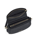 Lieblingstasche Big Sister black leather crossbody bag with gold zipper details and open interior compartments