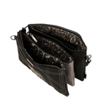 Lieblingstasche black cross-body bag with multiple zippered compartments and patterned interior lining