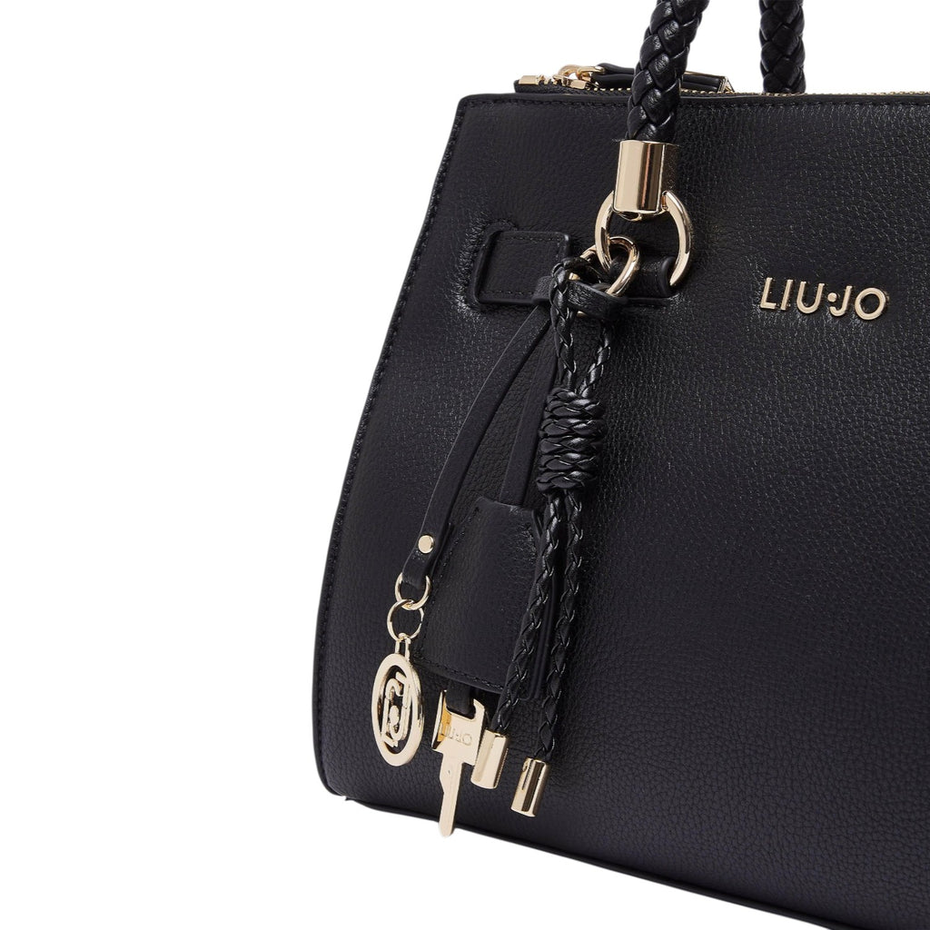 Lieblingstasche black ECS Satchel S handbag with gold hardware, braided handle details, and logo charm