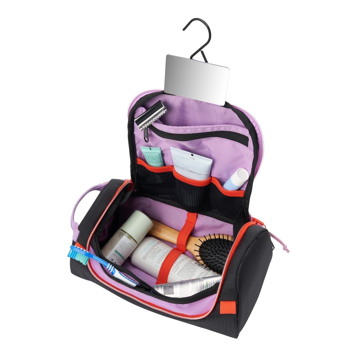Lieblingstasche Wash Pack hanging toiletry bag in black with purple interior, mirror, and organized compartments.
