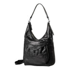Lieblingstasche Mrs. Banoffee Pie black leather hobo bag with a slouchy silhouette and front pocket detail