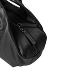 Lieblingstasche Beauty black pebbled leather handbag with a secure top zipper closure and matching leather pull tabs.