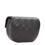 Lieblingstasche black quilted faux leather flap bag with curved silhouette.
