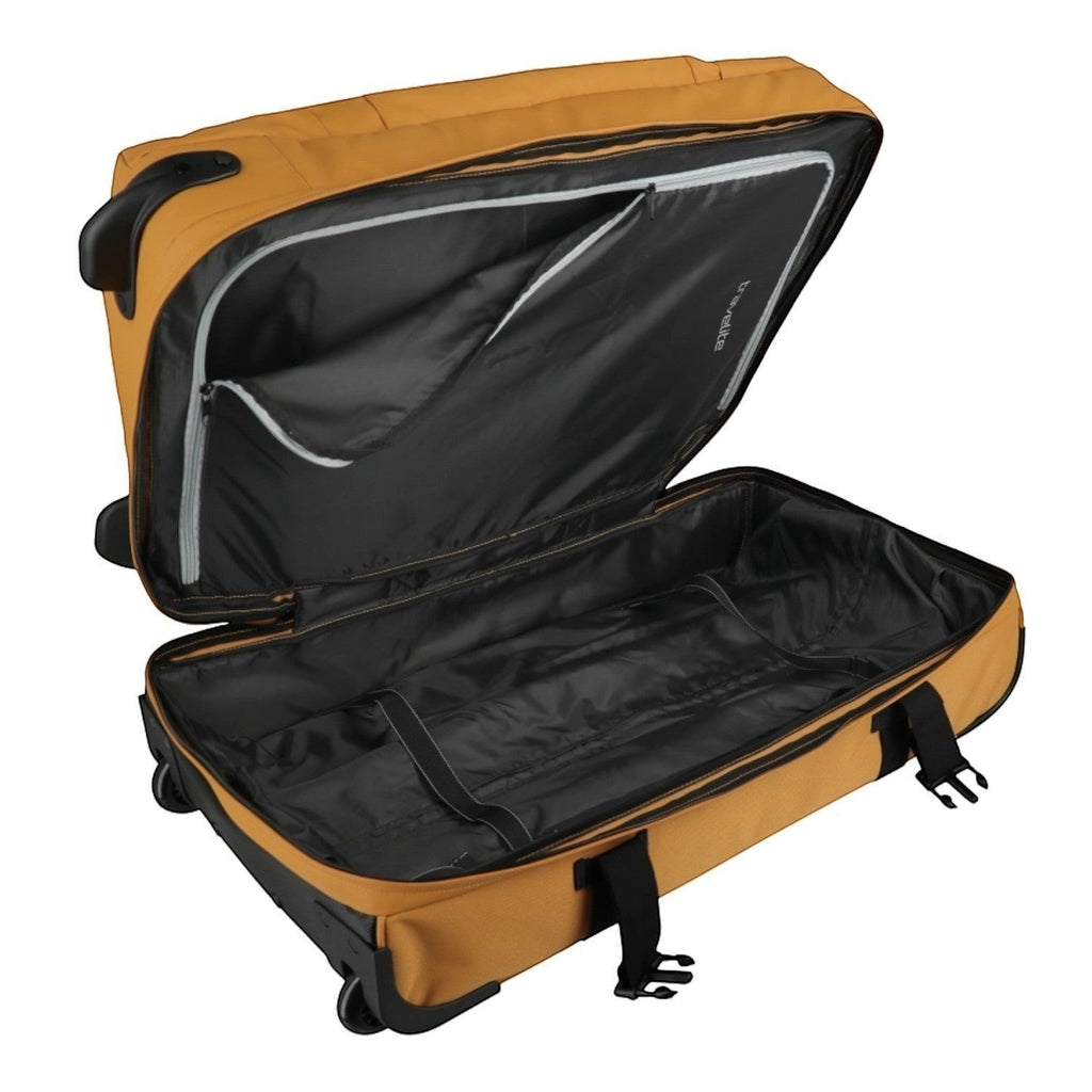 Lieblingstasche BOLONIA S rolling travel bag in mustard yellow with black interior and compression straps.