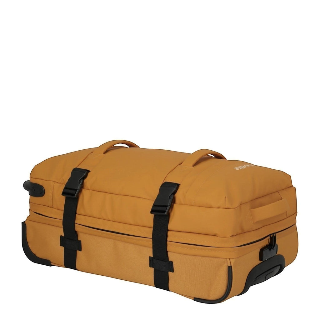 Lieblingstasche BOLONIA M rolling travel bag in mustard yellow fabric with black straps and wheels.