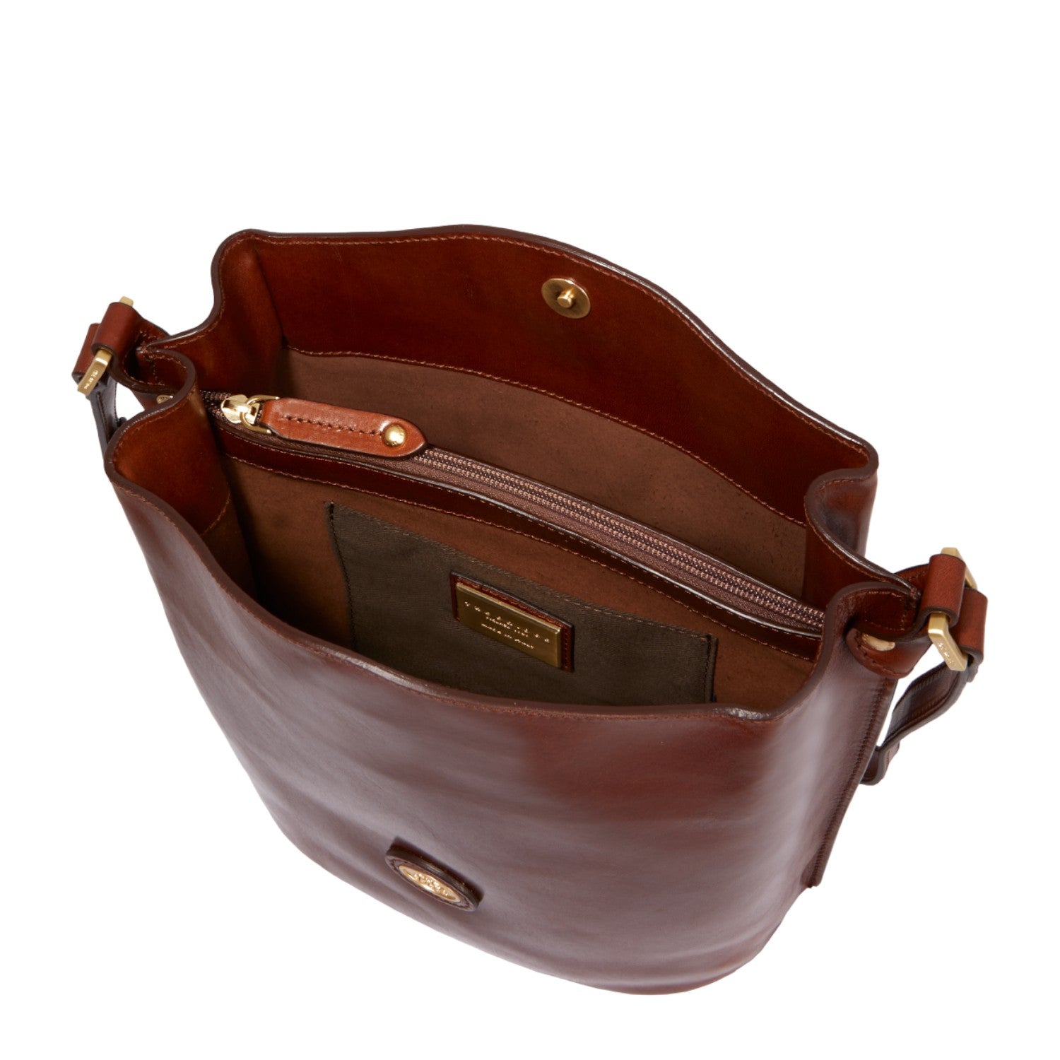 Lieblingstasche brown leather bucket bag with gold hardware and zip closure. Interior features a zip pocket and slip pocket.