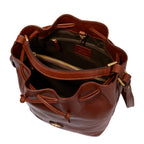 Lieblingstasche brown leather drawstring bucket bag with shoulder strap and gold hardware.