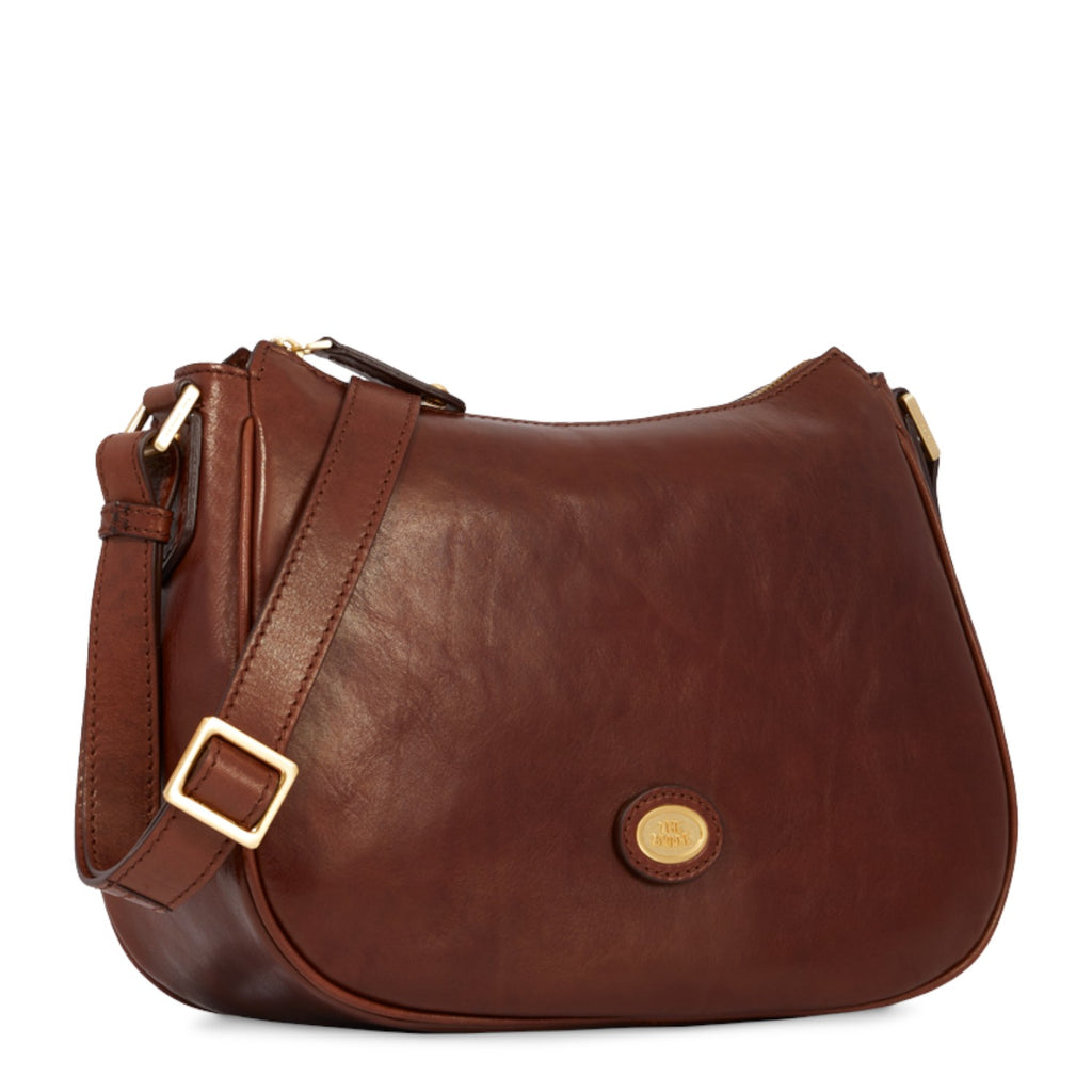 Lieblingstasche brown leather shoulder bag with zipper and adjustable strap, featuring a gold-tone logo emblem.