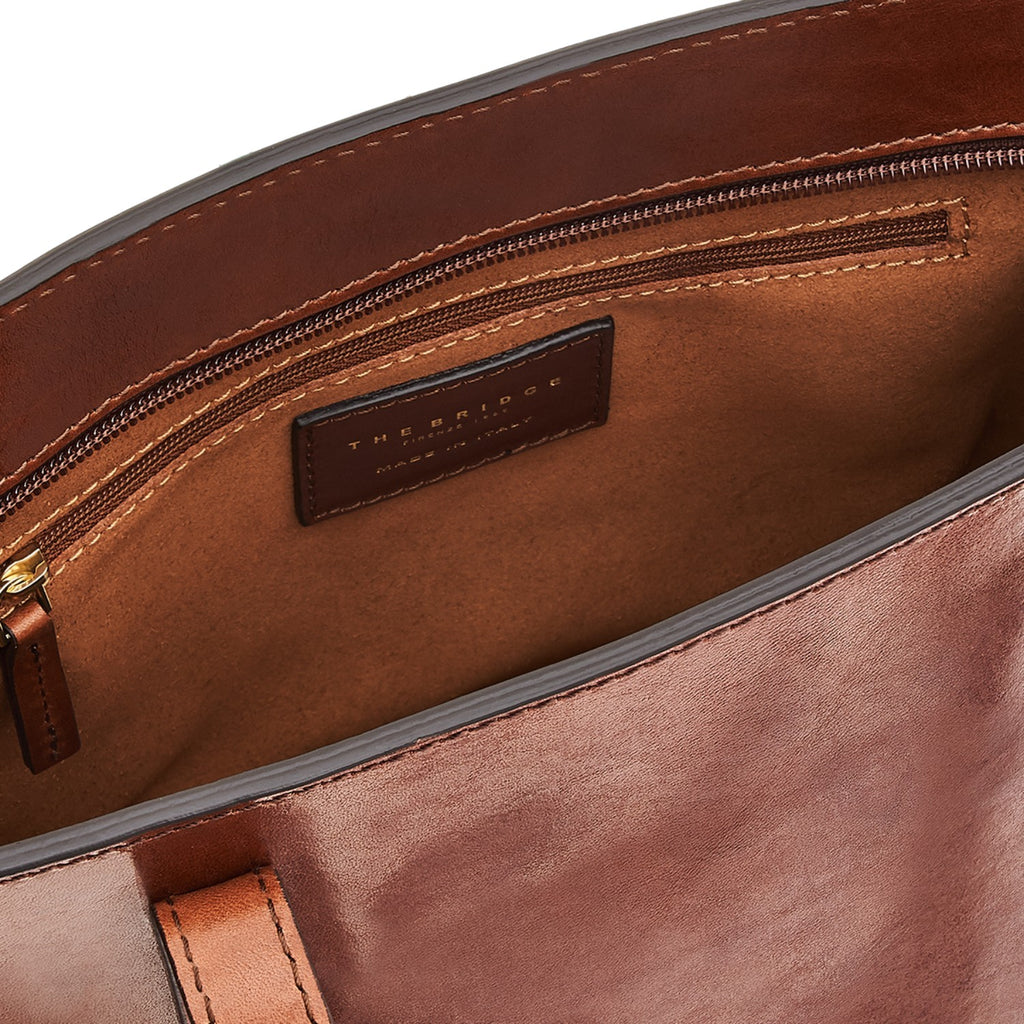 Lieblingstasche brown leather tote bag interior with zip pocket and brand logo detail.
