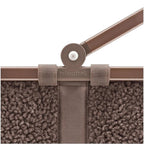Lieblingstasche Carrybag in brown teddy fleece material with a sturdy folding aluminium handle and logo detail