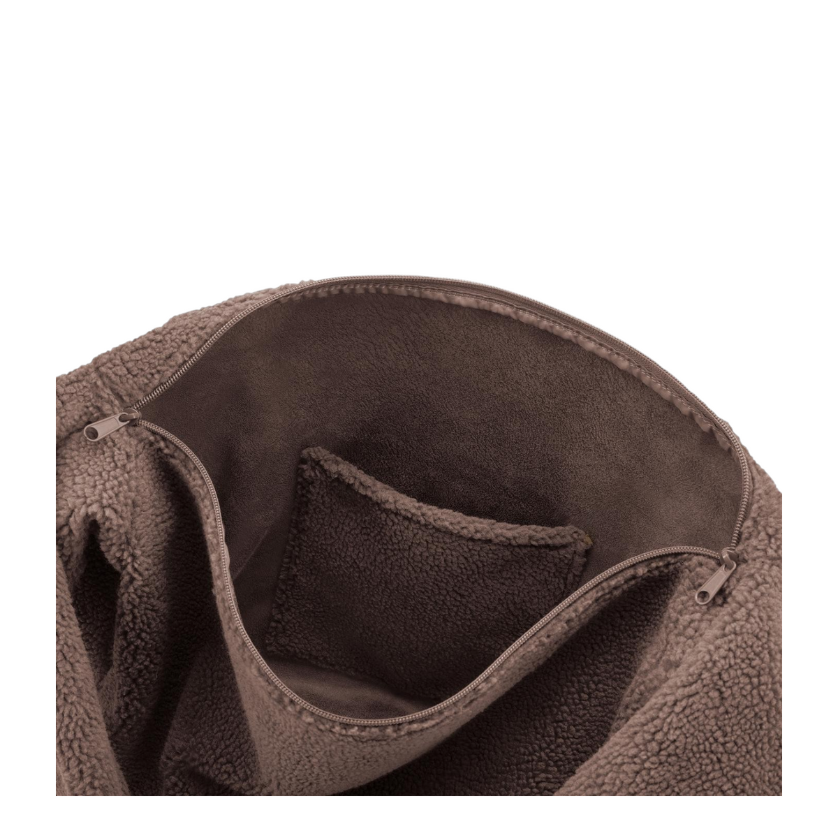 Interior view of a brown Lieblingstasche moonbag featuring soft teddy fleece lining and a convenient slip pocket.