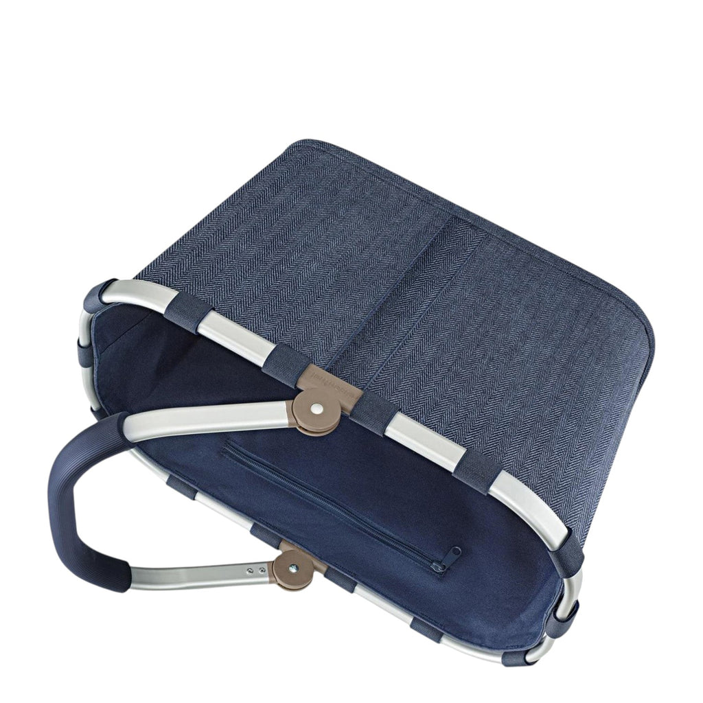 Lieblingstasche Carrybag in dark blue herringbone pattern with a sturdy aluminium handle and foldable design
