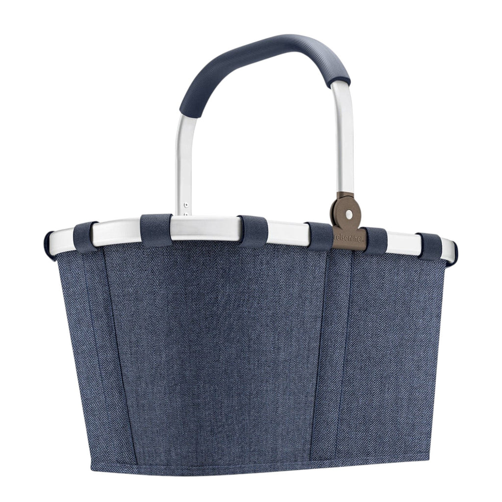 Lieblingstasche Carrybag in navy blue with a herringbone pattern, featuring a sturdy aluminium handle and soft grip.
