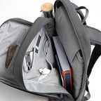 Lieblingstasche Commuter Pack in grey with open compartments, organized pockets, and a laptop sleeve.