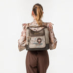Lieblingstasche convertible backpack with Anekke illustration, featuring brown and beige faux leather details.
