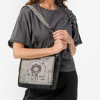 Lieblingstasche cross-body bag featuring a whimsical Sing Your Soul illustration on a grey and black synthetic material