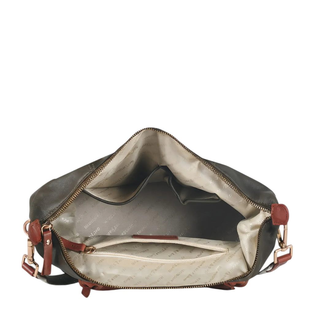 Lieblingstasche Lucia M dark green leather hobo bag with brown accents and multiple interior pockets.