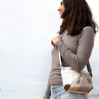 Lieblingstasche Deern Lütt crossbody bag made from recycled white and grey sailcloth with brown leather accents