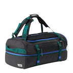 Lieblingstasche Duffel Pack in black with teal and blue accents, featuring expandable storage and backpack straps.