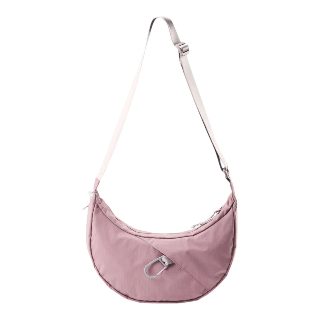 Lieblingstasche dusty pink crescent-shaped nylon sling bag with an adjustable strap and silver carabiner detail