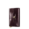 Lieblingstasche Envelope Premium Naplak wallet in glossy dark burgundy patent leather with a gold snap button closure