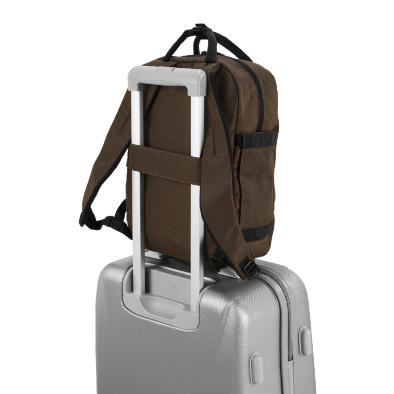 Lieblingstasche eoto Small16 brown compact daypack attached to a silver trolley suitcase handle
