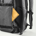 Lieblingstasche eoto Tall41 grey travel backpack with yellow wallet in side pocket and breathable back padding