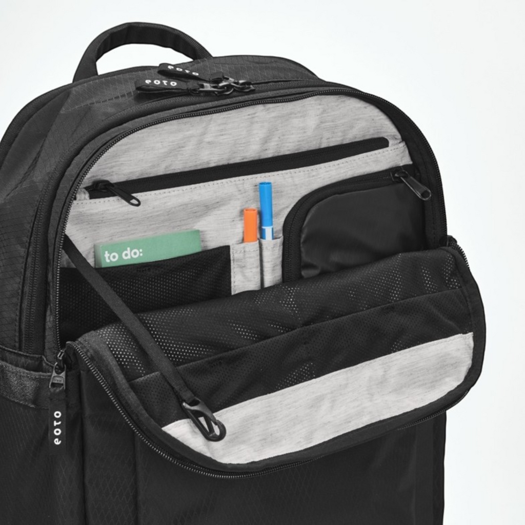 Lieblingstasche eoto Tidy22 black business backpack showing the open front organizer compartment with pen slots