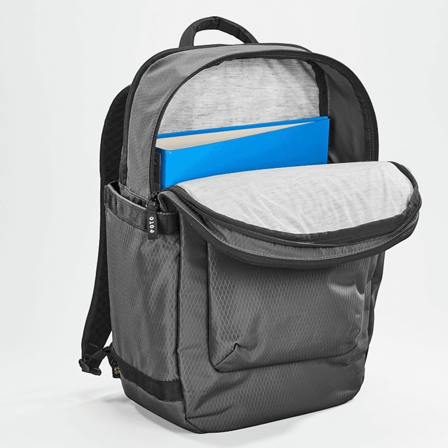 Lieblingstasche eoto Tidy22 grey business backpack with open main compartment containing a blue folder
