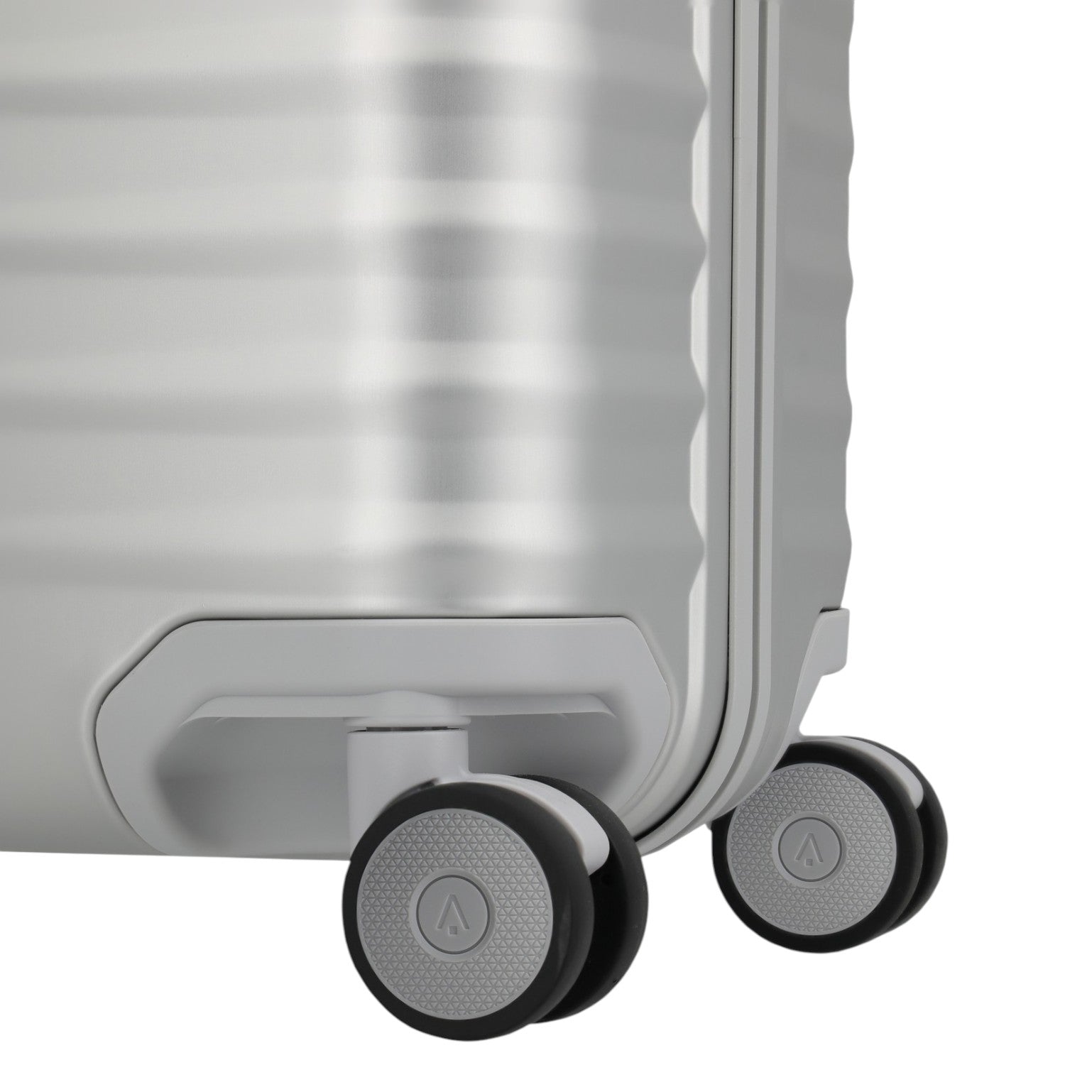 Lieblingstasche Eternity S23 silver aluminium trolley suitcase with four spinner wheels and textured surface.