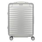 Lieblingstasche Eternity S23 silver aluminum trolley suitcase with ribbed texture, leather handles, and spinner wheels.