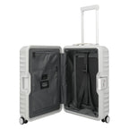 Lieblingstasche Eternity 4W Trolley S23, a white aluminium suitcase with a plastic frame, leather handles, and TSA lock. Open to show interior.