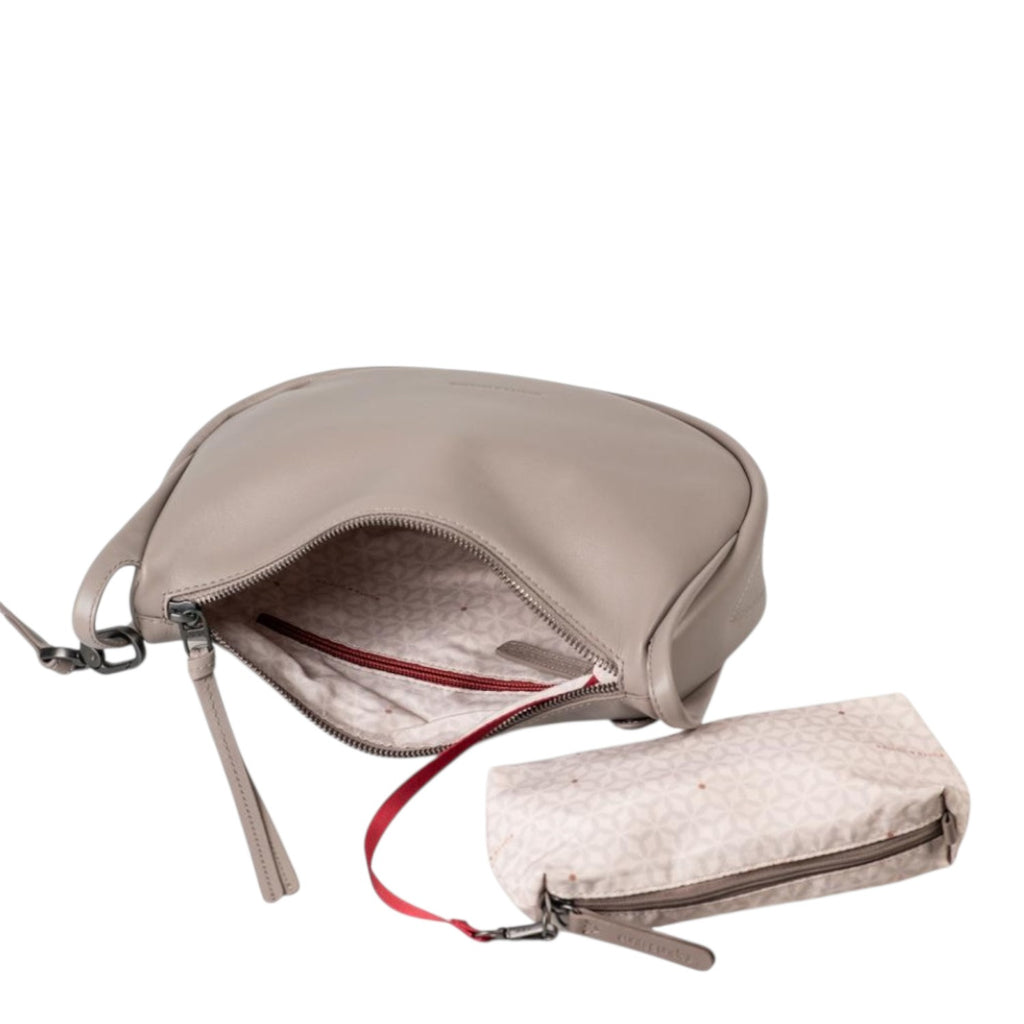 Lieblingstasche Fawn taupe leather shoulder bag with an open main compartment and a matching patterned inner pouch.