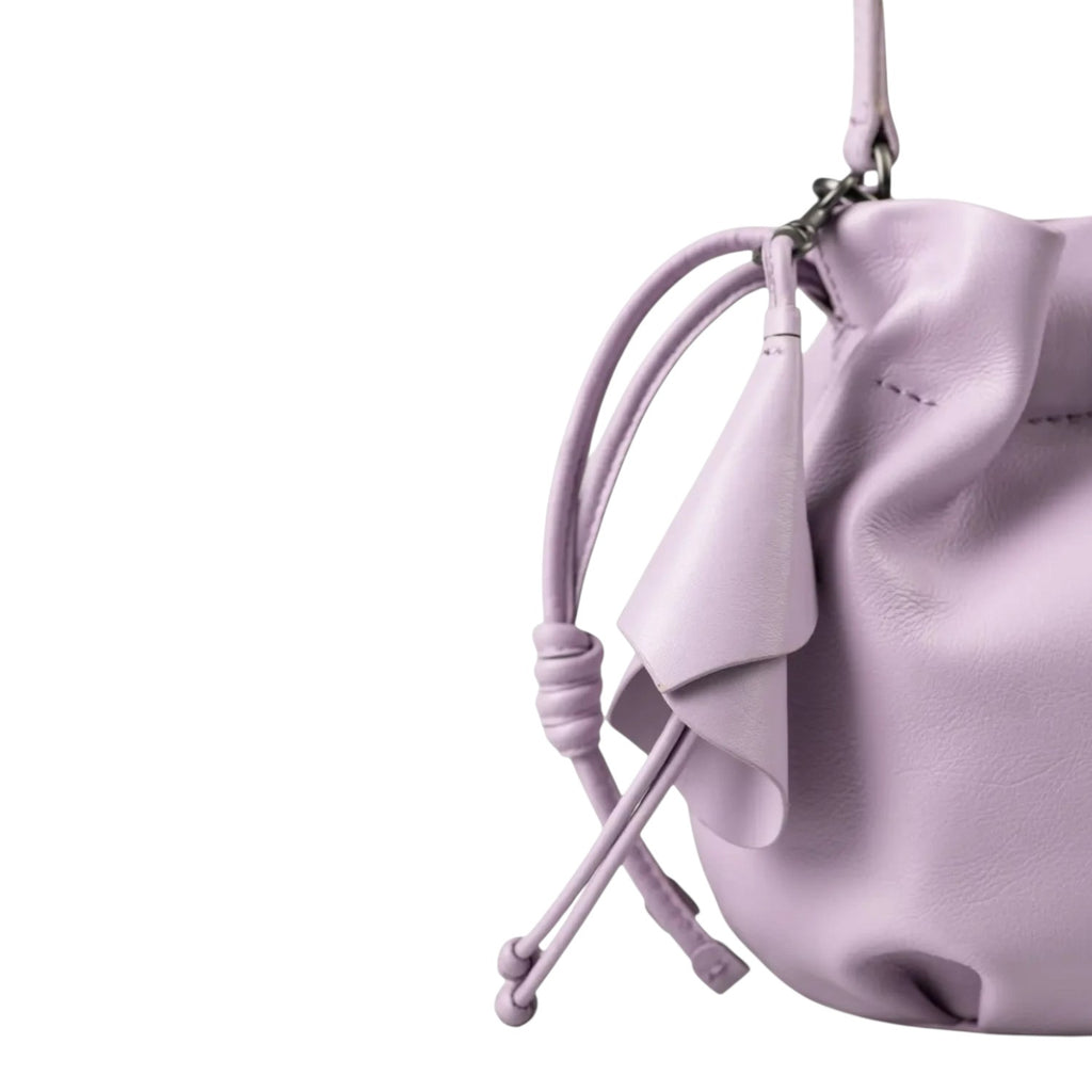 Lieblingstasche Fleur lavender leather bucket bag with drawstring closure and decorative petal detail